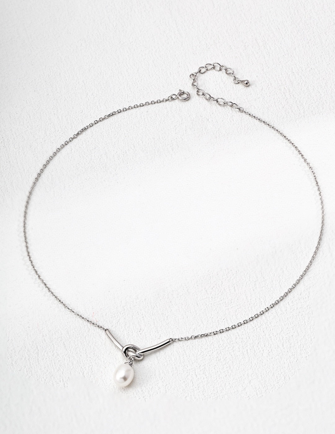 Knot of Pearl Necklaces