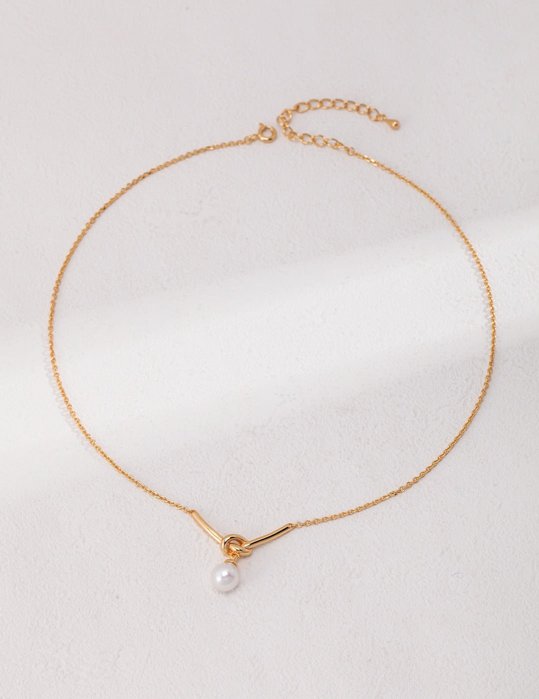 Knot of Pearl Necklaces